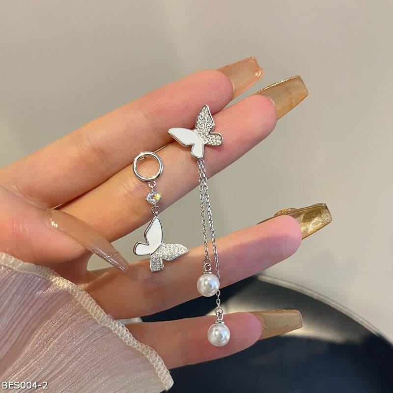 Butterfly asymmetric pearl tassel earrings