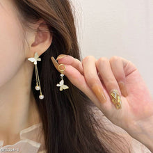 Butterfly asymmetric pearl tassel earrings
