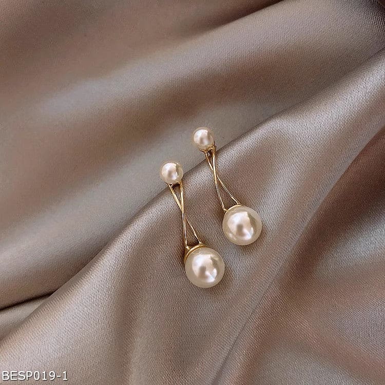 Pearl stud earrings