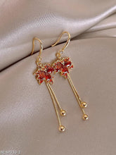 Maple leaf tassel earrings