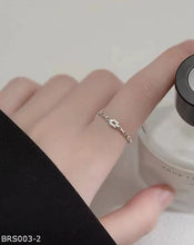 Checkered zircon ring