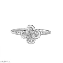 Clover micro-set zircon ring