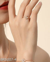 Clover micro-set zircon ring
